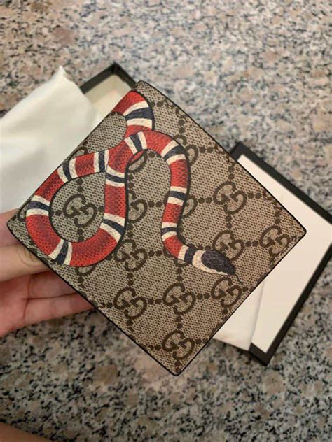 mens gucci wallet fake|authentic gucci snake wallet.